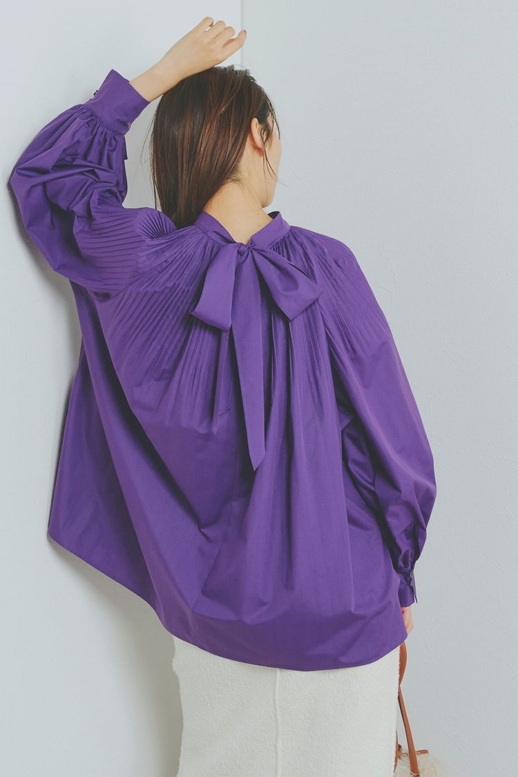 大人は後ろにリボンを持ってくる